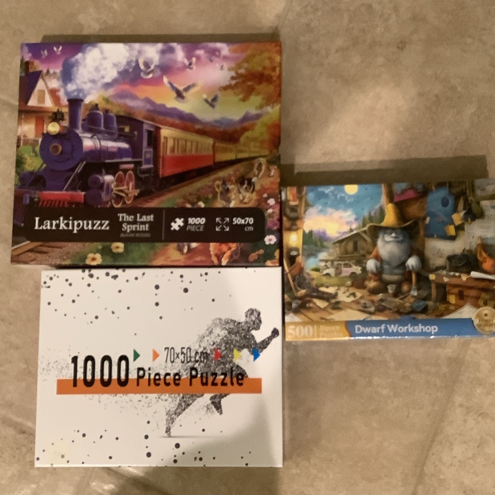 Three puzzles: 2=1000 pieces and 1=500 pieces. Letters on back